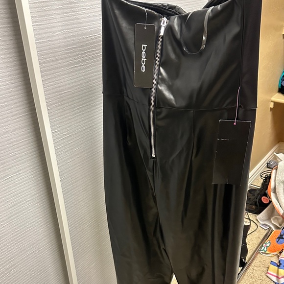 BEBE SPLIT HEM STRAPLESS VEGAN LEATHER JUMPSUIT - Picture 7 of 7